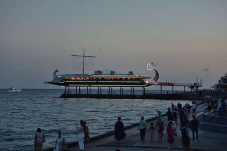YALTA, CRIMEA SEPTEMBER 6, 2017: View of the evening embankment of the city of Yalta