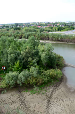 Footprints in the sand on the bank of the Irtysh River, Omsk region, Siberia, Russia                ...