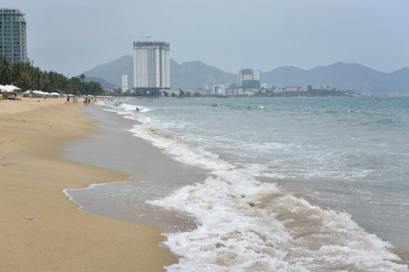 VIETNAM, NHA TRANG - MARCH 29, 2018: City of Nha Trang cityscape with high buildings and skyscrapers. Asian town business center landscape.のeditorial素材