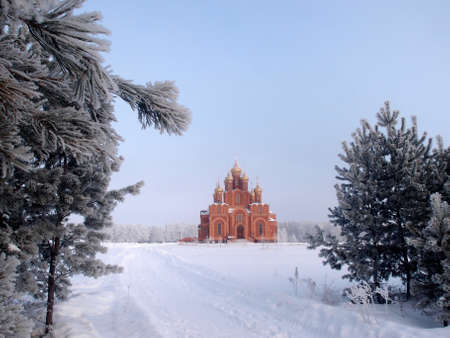 Winter view of the Cathedral of the Assumption of the Blessed Virgin Mary in the territory of the Achair monastery, Omsk region, Siberia, Russiaの写真素材