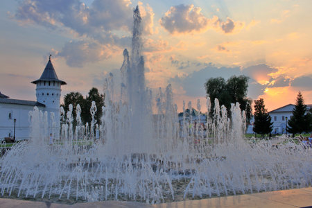 TOBOLSK, RUSSIA - AUGUST 25, 2021: Evening view of a beautiful fountain on Red Square in the city of Tobolsk Russiaの写真素材