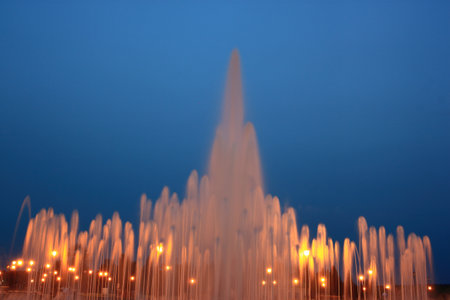 Evening view of a beautiful fountain on Red Square in the city of Tobolsk Russiaの写真素材