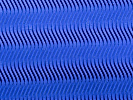 The Texture Of Blue Pressed Paper In Vertical Waves. Blue Corrugated Wavy Cardboard Texture...