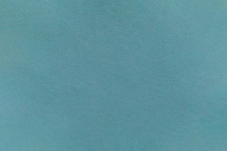 light blue paper texture. Blue pastel color paper texture background. Recycled paper texture background in turquoise green vintage colorの写真素材