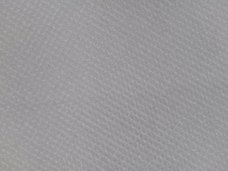 Surface texture of white frosted ribbed glass for backgroundの写真素材