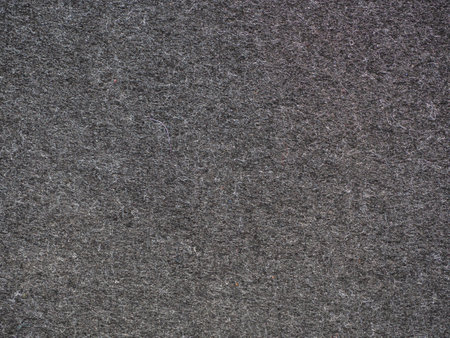 Dark texture- felt fabric in black and gray close-up for backgroundの写真素材