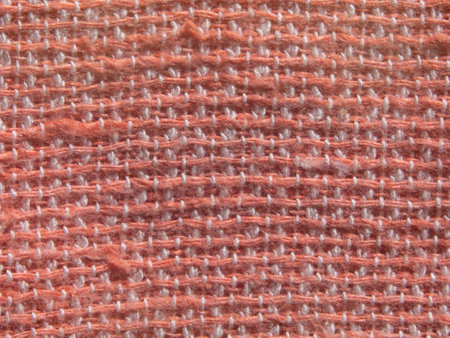 Macro photo of knitted fabric texture for background and designの写真素材