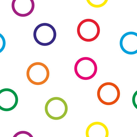 Seamless pattern of randomly arranged multicolored rings. Elegant children's printのイラスト素材