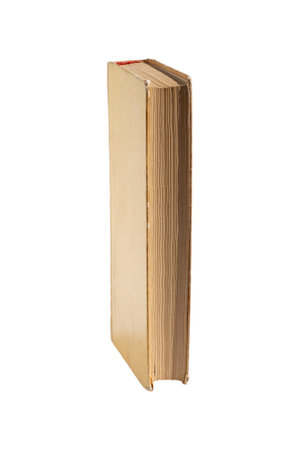 Closed old hardcover book isolated on white. Standing old battered book isolated on a white backgroundの写真素材