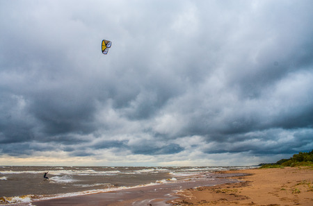 Kite surfing. The wind is the sea and waves. Nature landscape.の写真素材
