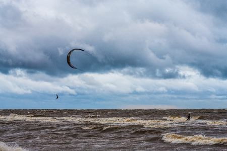 Kite surfing. The wind is the sea and waves. Nature landscape.の写真素材
