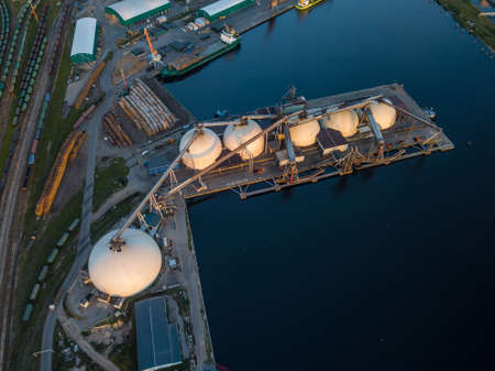 Gas storage terminal in the sea port. Baltic sea, Daugava river. Aerial, Riga, Latvija.の写真素材
