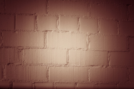 Wall.Painted in white Brick.