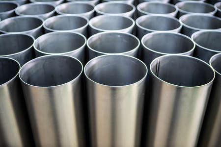 Welded seam on stainless steel ventlation pipes. Metal industry. Close-up.