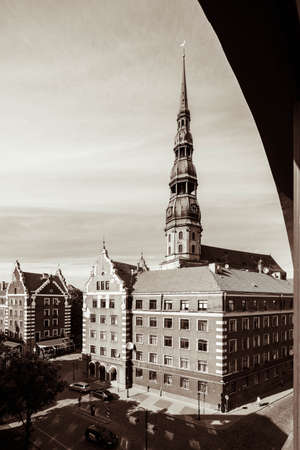 Old town of Riga Latvia. Modern and traditional architecture. Red tile roofs. St. Peter's Church....