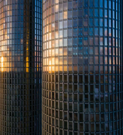 Modern urban architecture. Steel and glass facade of skyscrapers.の写真素材