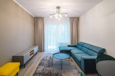 Modern light interior of living room in studio apartment. Furniture.の写真素材