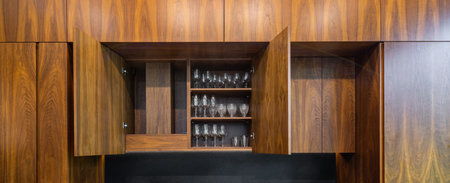 Modern interior of luxury apartment. Wooden kitchen. Black counter.の写真素材