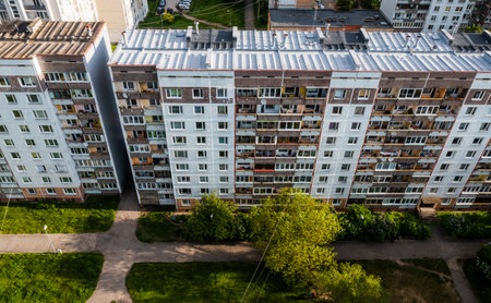 Above view of residential area in city. Multi-storey panel buildings.の写真素材
