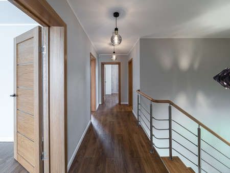 Modern interior of luxury private house. Hallway with parquet floor.の写真素材