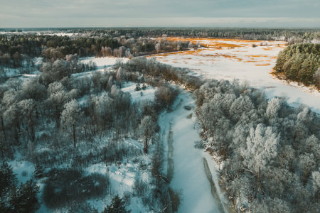 Beautiful winter nature. Scenic landscape. Top drone view of forest.の写真素材
