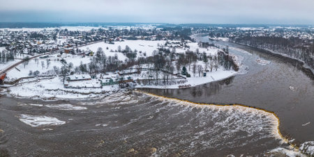 Winter landscape. Aerial view of Venta Rapid (Ventas rumba), waterfall on the Venta River in Kuldiga, Latvia. Widest waterfall in Europe.の写真素材