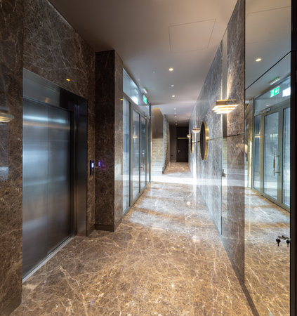 Modern marble interior of entrance hall in luxury residential buildingの写真素材