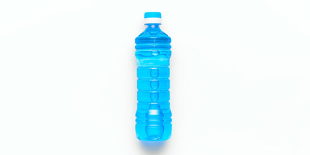 Bottle of blue watter on the white background, flatlay, top view. Food concept