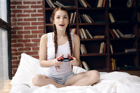 Woman play video games and using VR helmet. High quality photo