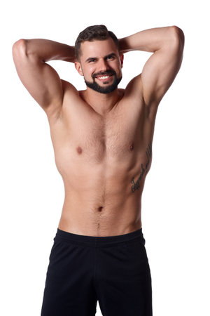 Handsome muscular man on isolated background shows his body. Sportsmans body. Sport conceptの写真素材