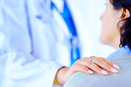 The doctor reassures the patient. Doctor and patient conversationの写真素材
