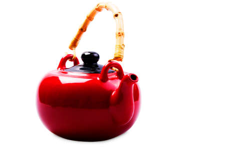 red teapot isolated on white backgroundの写真素材