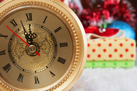 Christmas background with a blue ornament, gift box,  snow