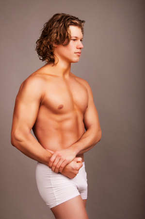 Portrait of mid in underwear. Studio shotの写真素材