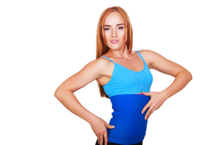Sporty slim fitness girl . Healthy lifestyle. Making sportの写真素材