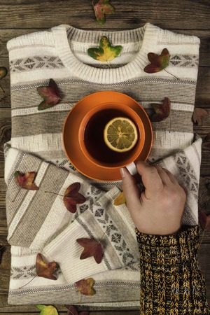 Concept autumn  with a  of hot teaの写真素材