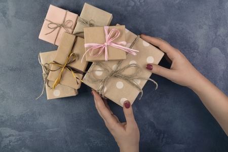 Conceptual photo of a Christmas gifts with gifts on a beton background.の写真素材