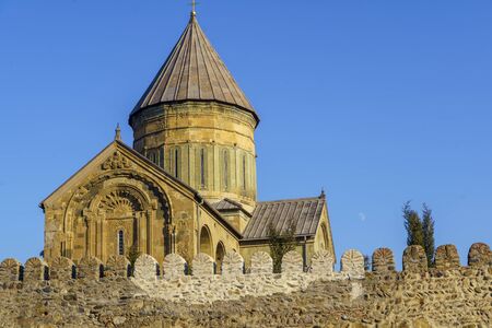 Svetitskhoveli Cathedral, Mtskheta, Georgia. The dome of the Cathedral above the battlements against...