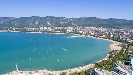 Panorama of Gelendzhik resort from a bird's-eye view. The Central beach of the resort and the city center are visible. Embankment, sanatoriums and boarding houses.の写真素材