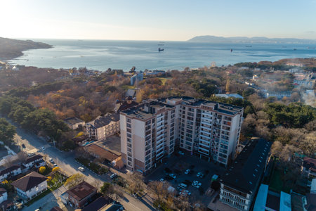 Panorama of resort village of Kabardinka from height. In foreground is residential complex. Autumn....