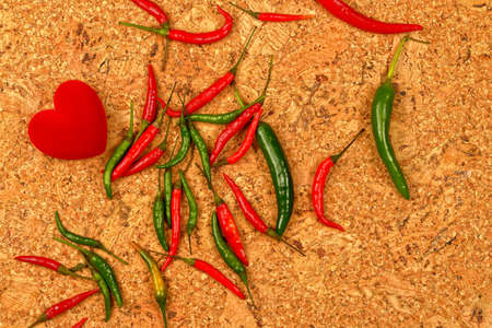 chili pepper on the cork background
