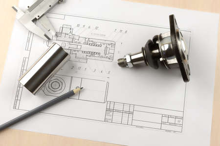 Ball joint to a cut and the steel parts on the tableの写真素材