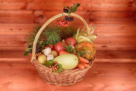 Wicker basket with vegetables on the day of Thanksgivingの写真素材