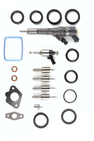 Spare parts for diesel engines on a white background