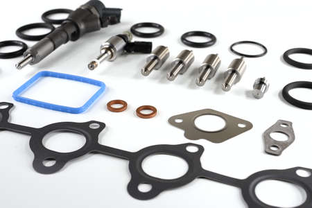 Spare parts for diesel engines on a white backgroundの写真素材