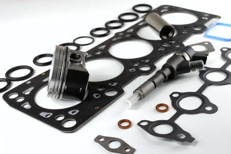 Spare parts for diesel engines on a white background