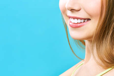 Perfect healthy teeth smile of a young woman. Teeth whitening. Dental clinic patient. Image...
