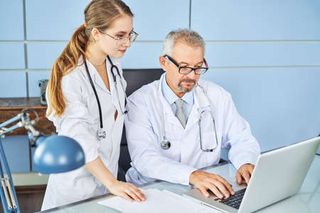 Medical Doctor Team are Discussing Conference for Examining Diagnose Their Patient Medical Report in...