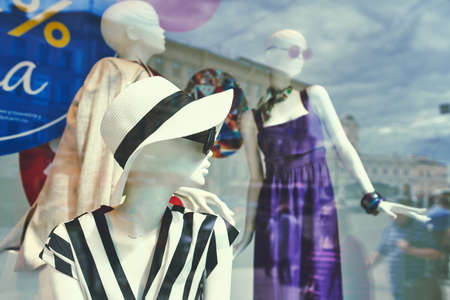 Boutique window with dressed mannequins