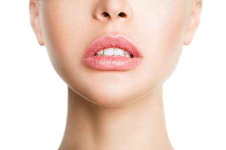 Sexual full lips. Natural gloss of lips and womans skin. The mouth is open. Increase in lips, cosmetology.の写真素材